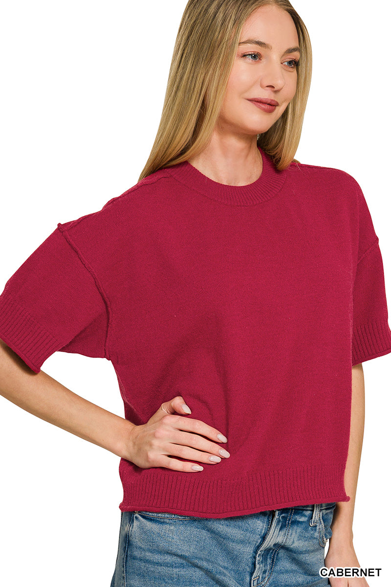 Light weight exposed seam short sleeve crop sweater