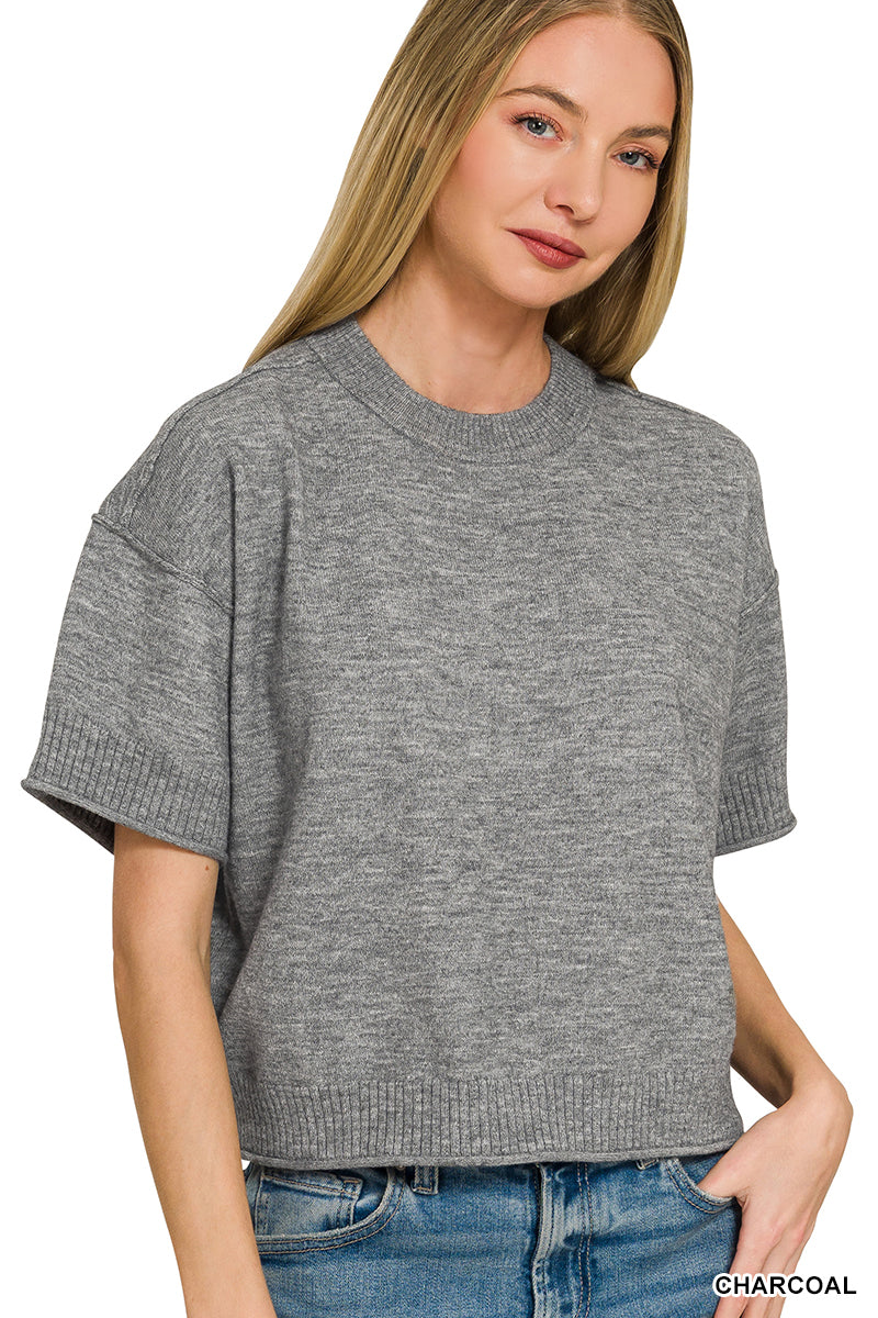Light weight exposed seam short sleeve crop sweater
