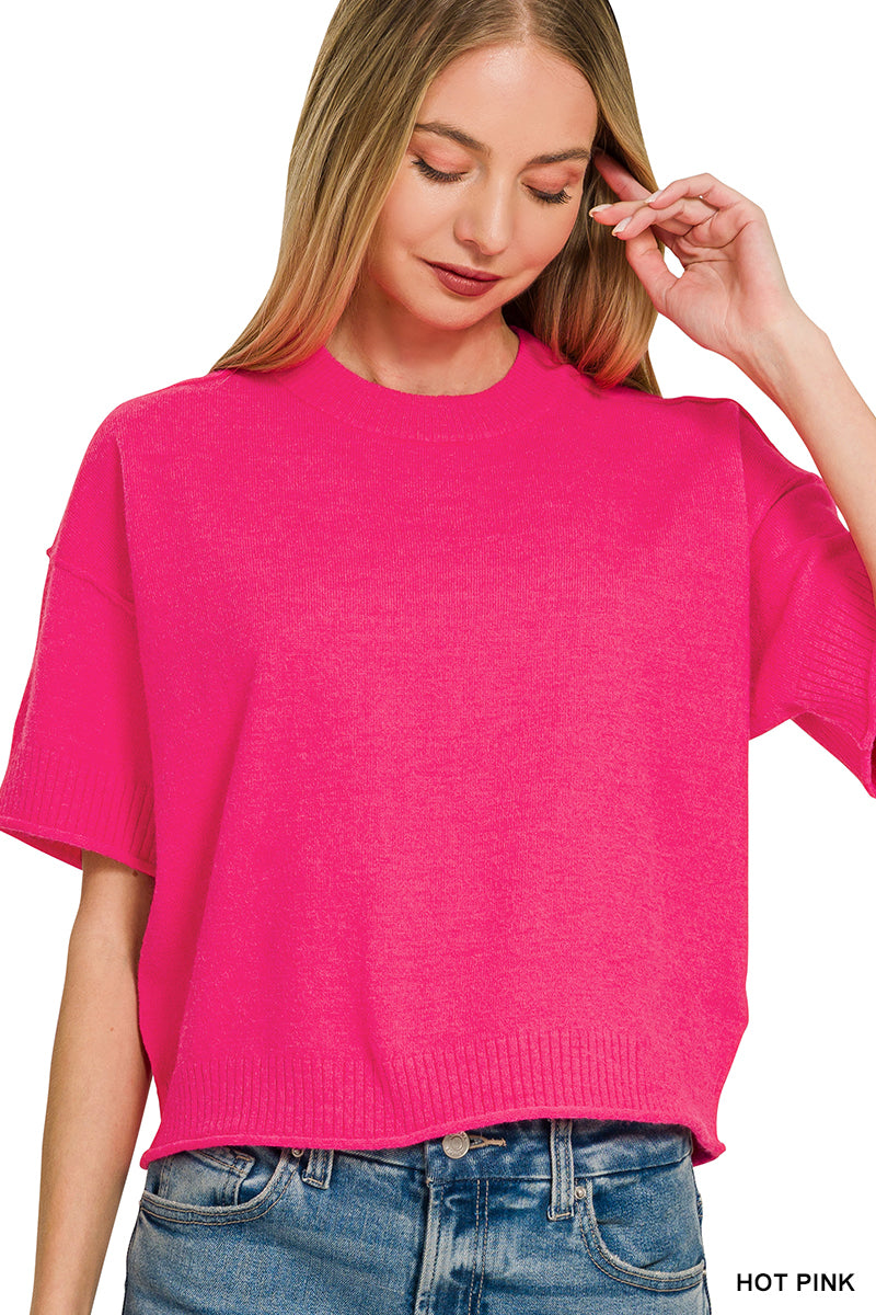 Light weight exposed seam short sleeve crop sweater