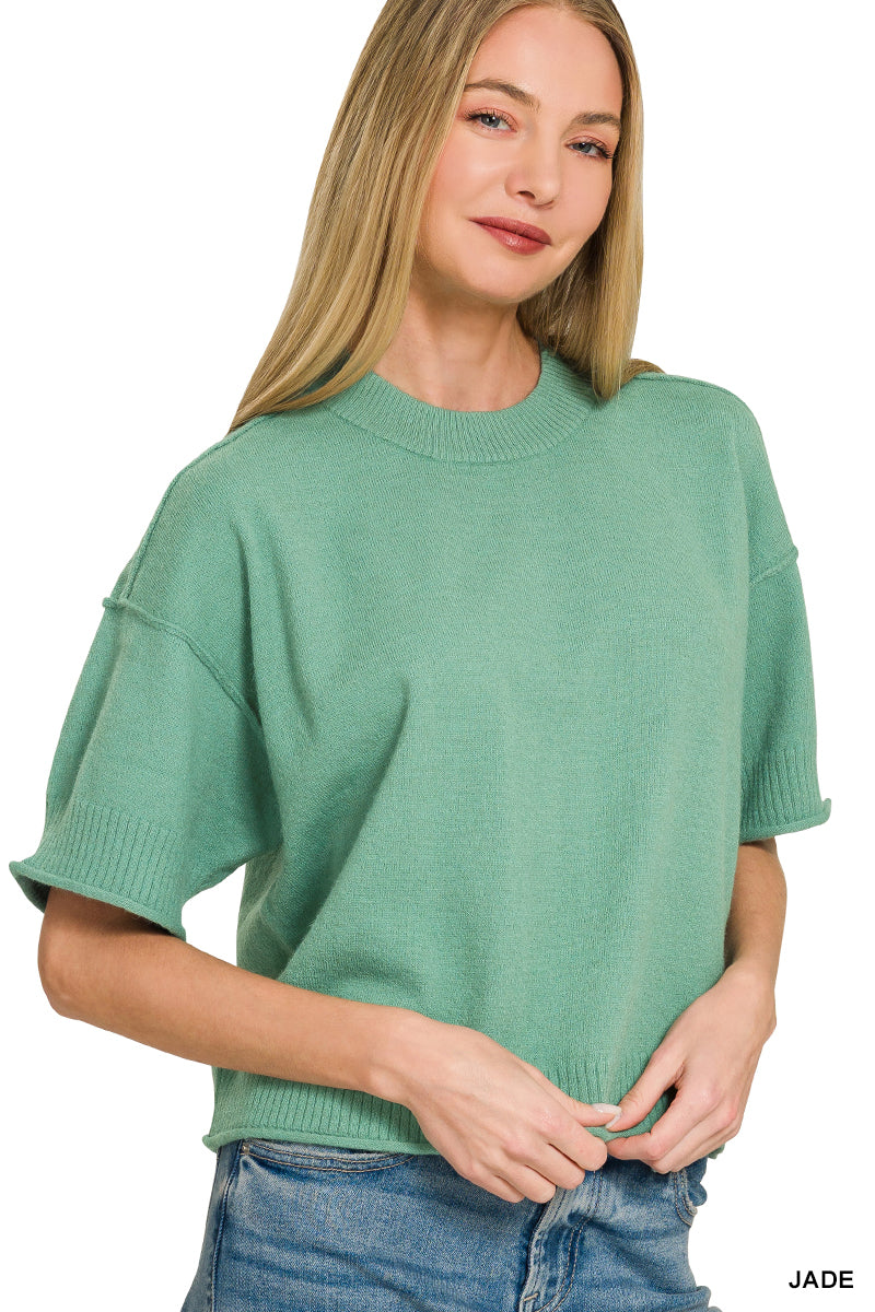 Light weight exposed seam short sleeve crop sweater