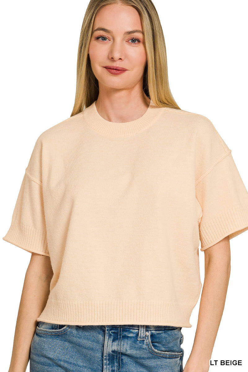 Light weight exposed seam short sleeve crop sweater
