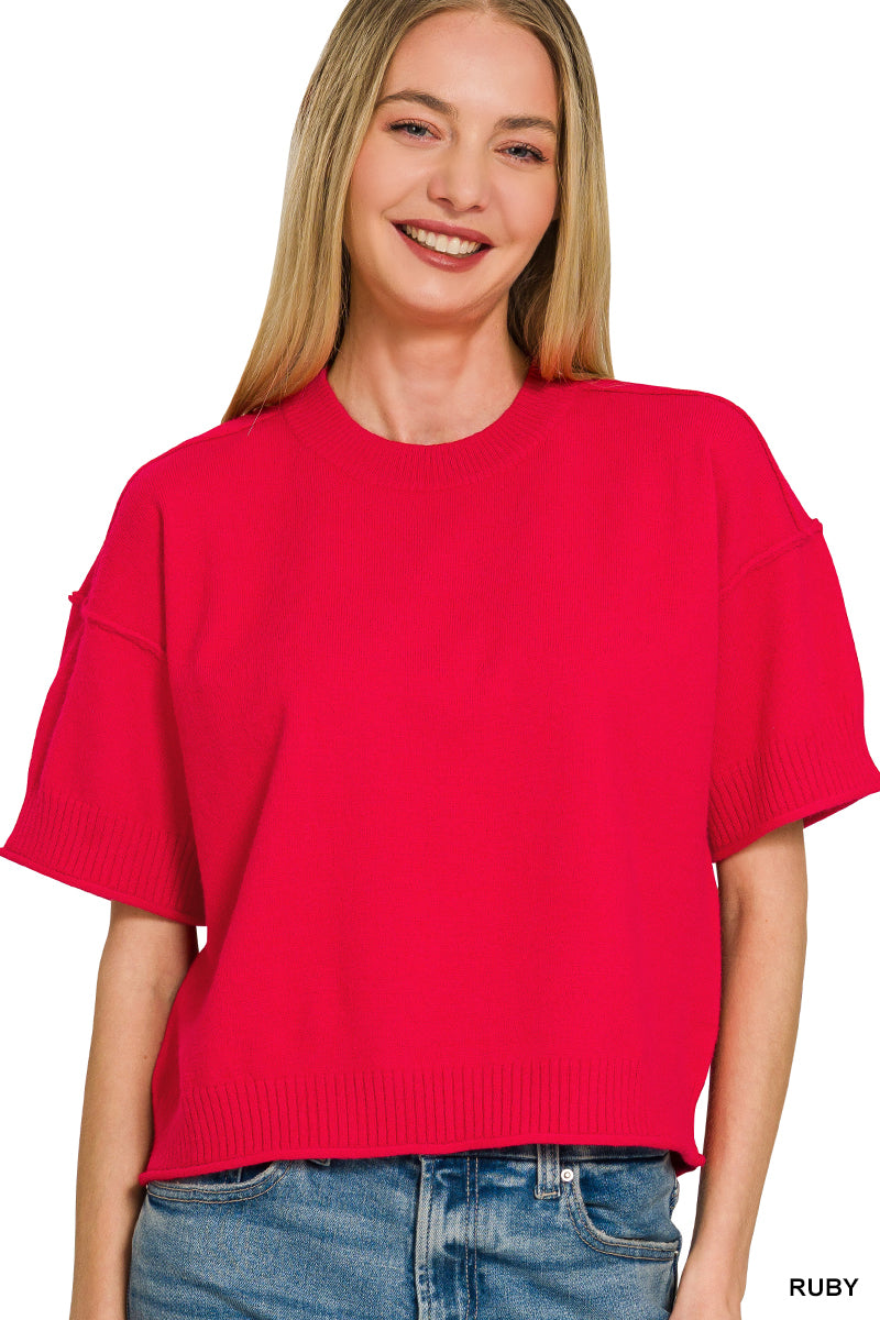 Light weight exposed seam short sleeve crop sweater